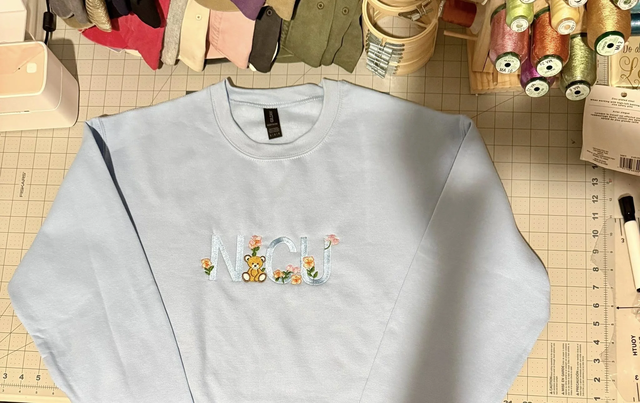 NICU light blue sweatshirt front.jpg