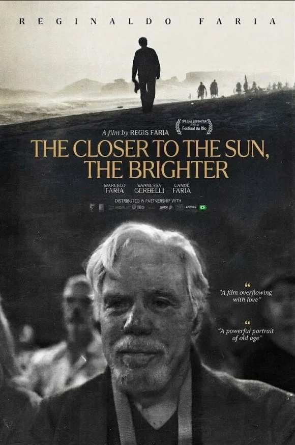 Black-and-white poster for The Closer to the Sun, the Brighter. A silhouetted man walks along a beach above a close-up portrait of an elderly man with white hair and beard.