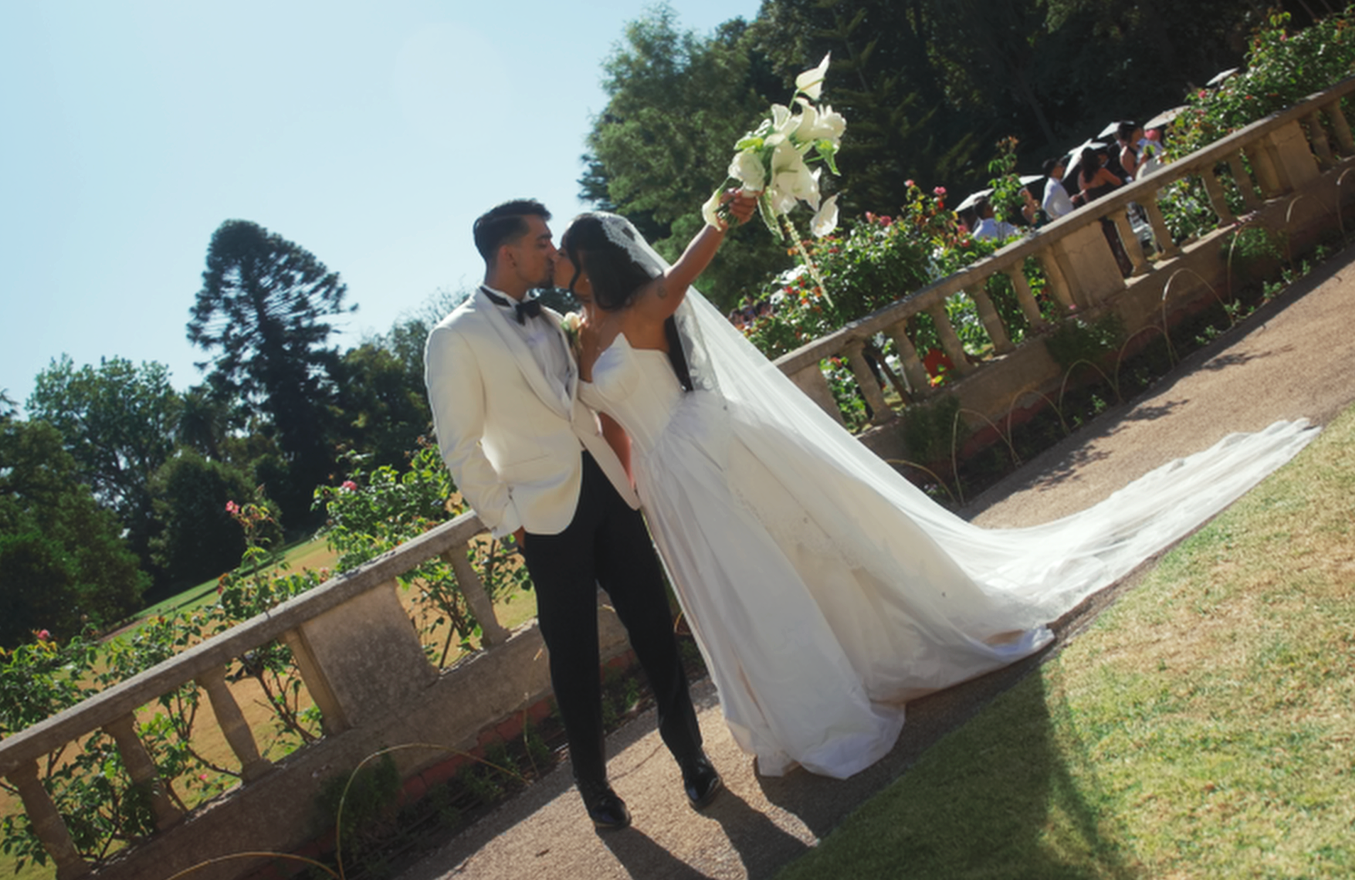 A bride and groom descending a decorated staircase for their wedding, its is captured by a wedding photographer in melbourne.
