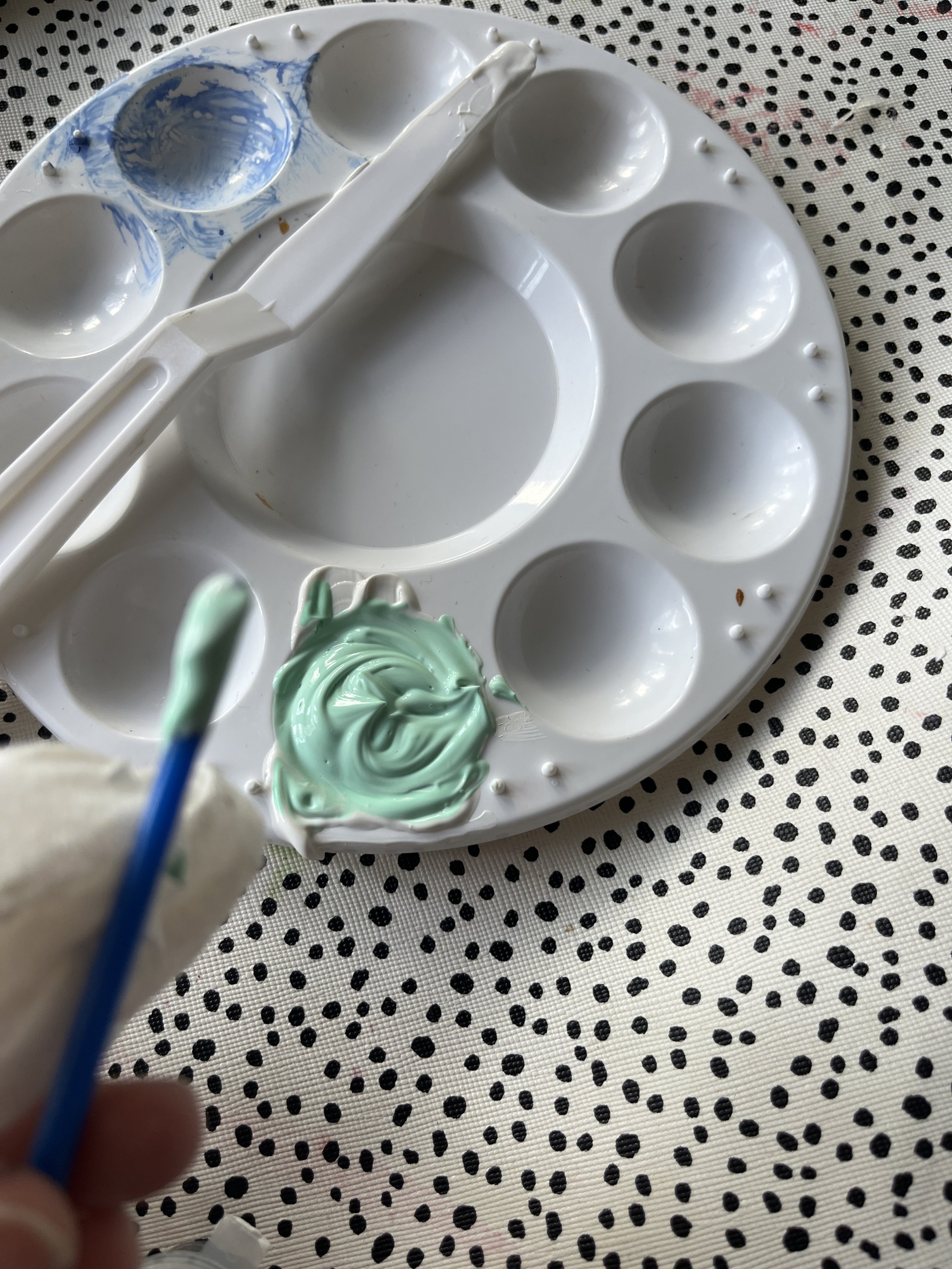 4. Use your paintbrush or the end of it to mix the colour into the paste until you are happy with it.