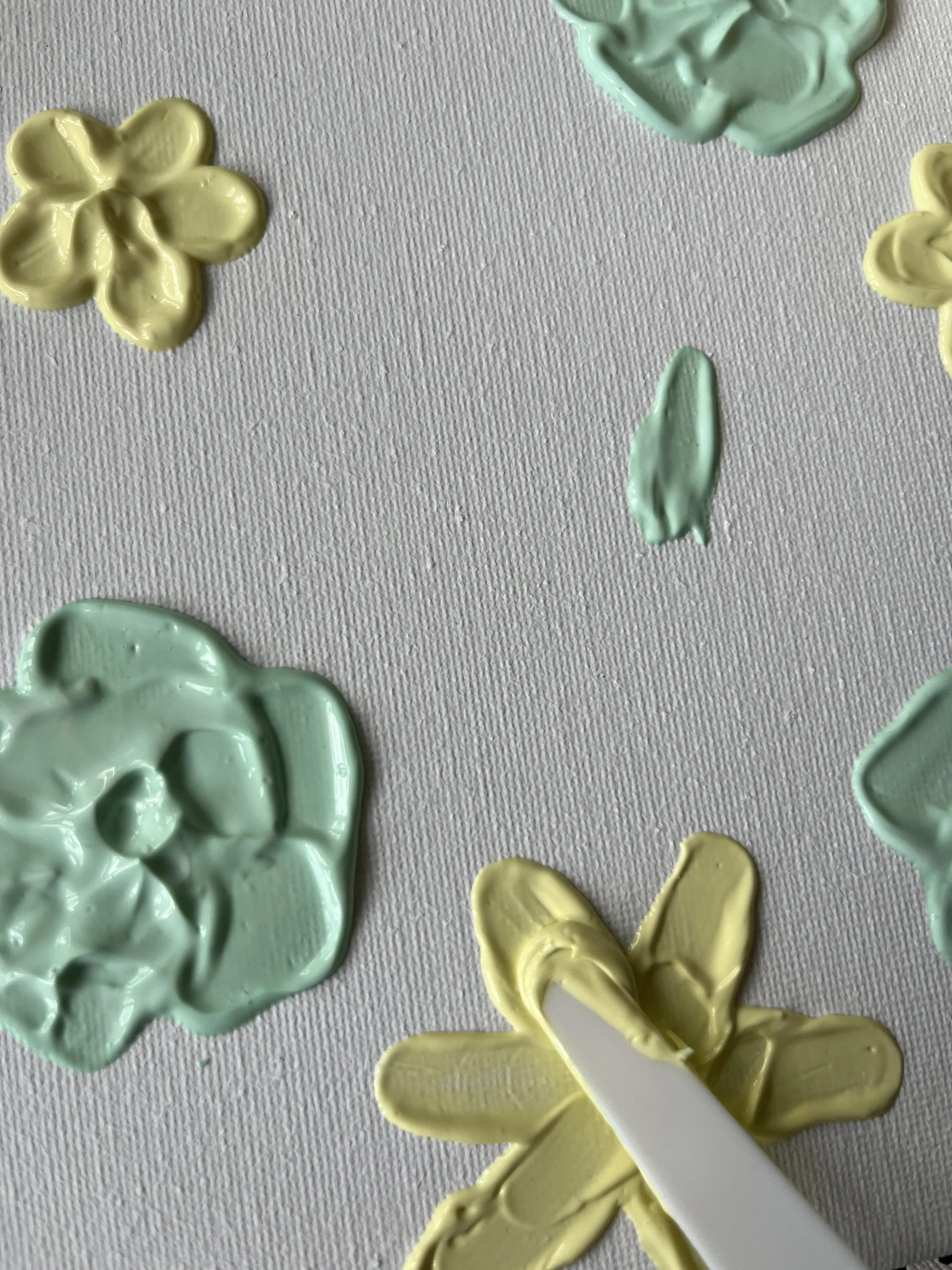 25. To create a 'dahlia' style flower, use the same knife to create longer 'stroke' petals.