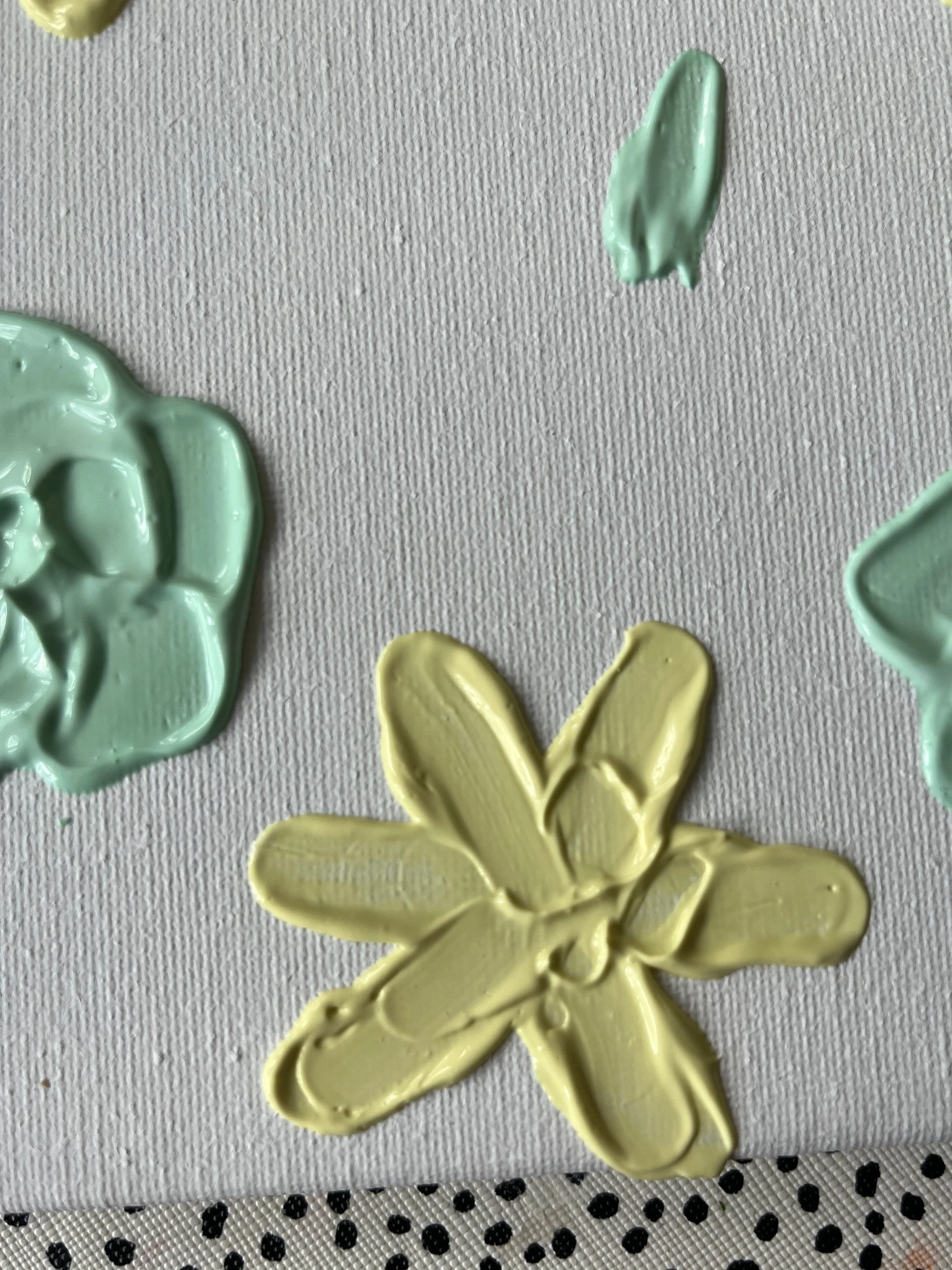 26. Build up the 'dahlia' by adding more paste closer to the middle and turning the canvas as you do each petal. 