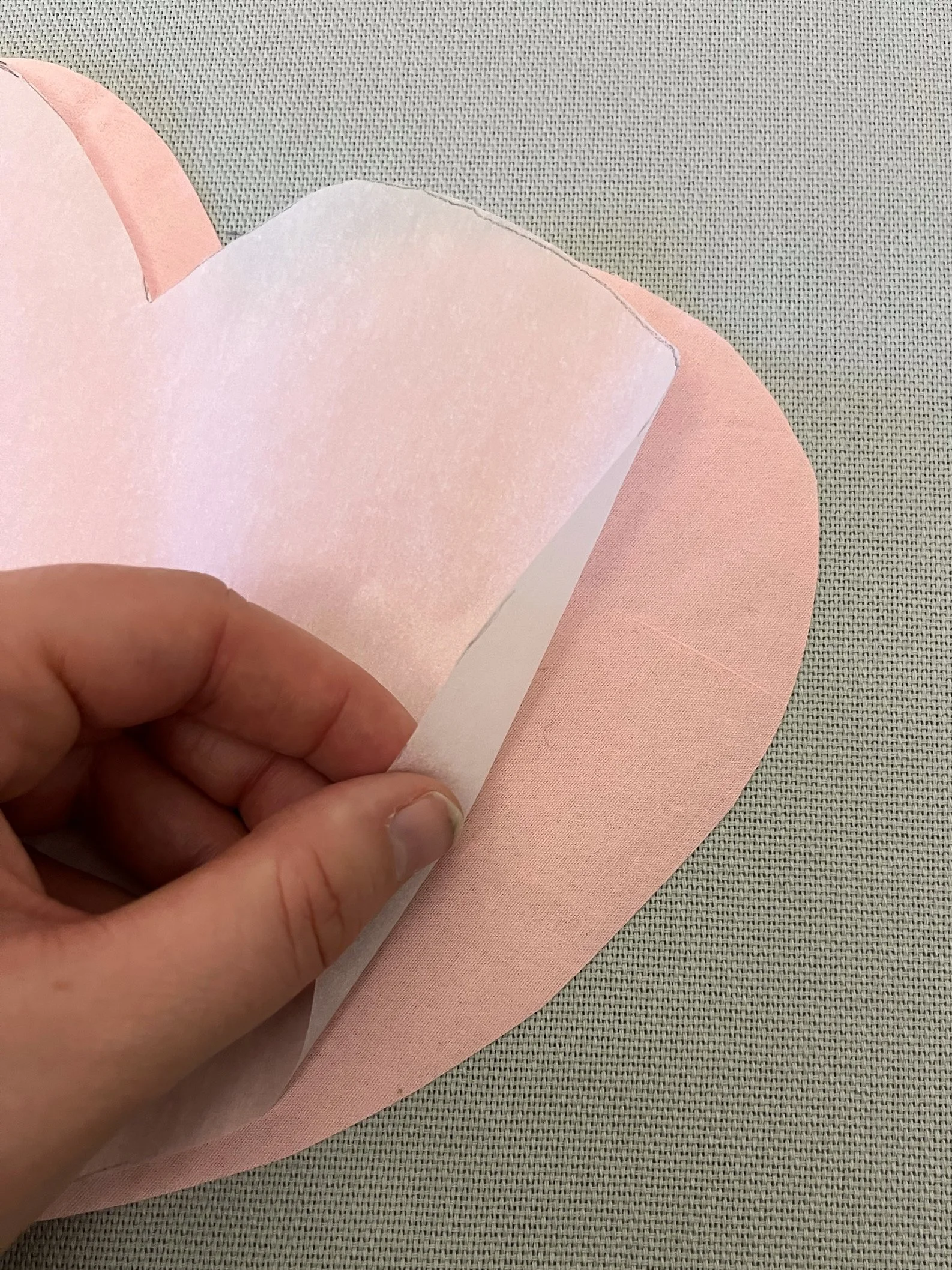5. Now you want to move onto your smaller, lighter coloured heart and peel off the backing paper.