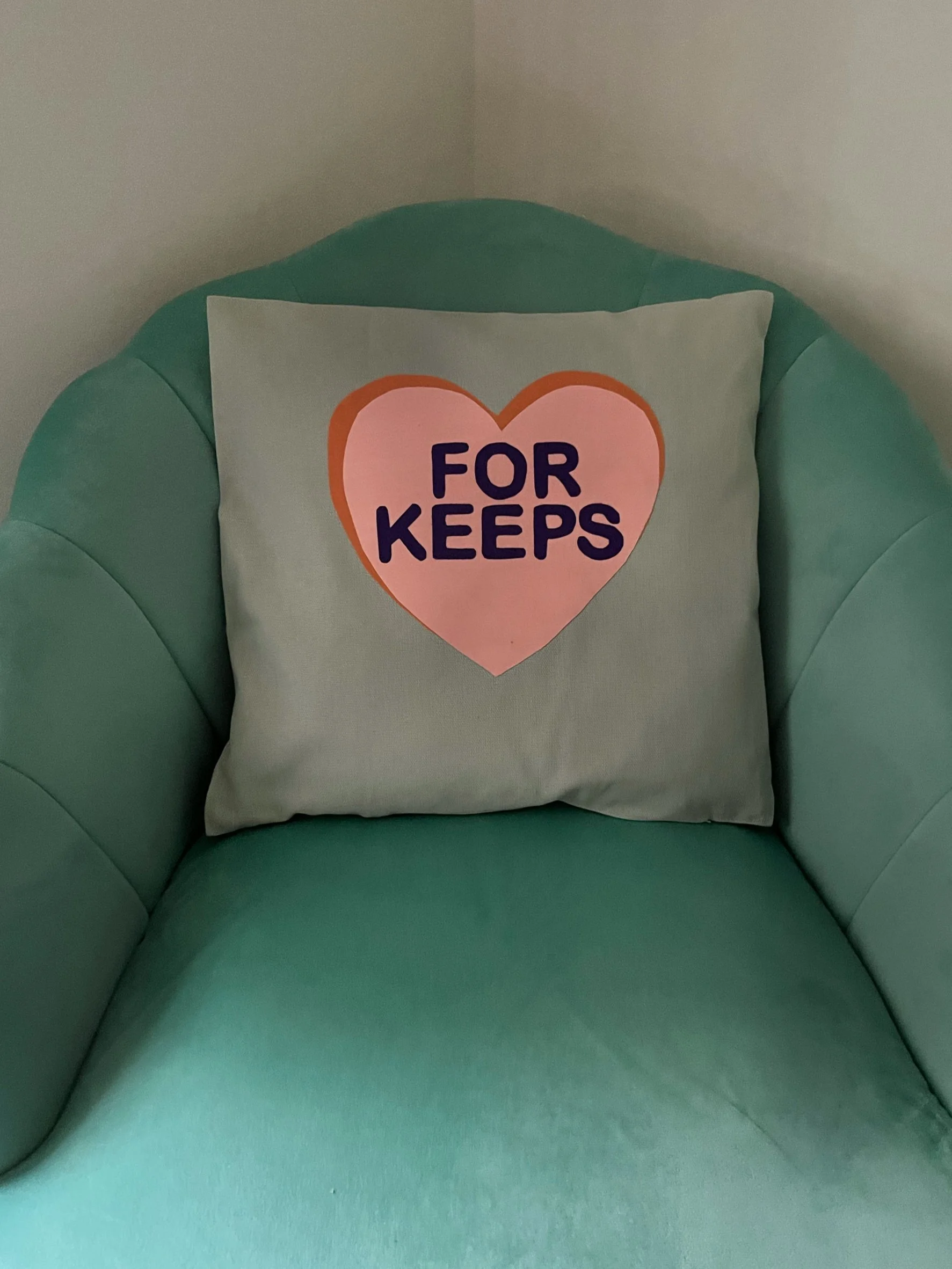 11. You now have your main design transferred to the cushion cover! Just check that there are no loose areas and just go over with the iron again if there is. If you're struggling with it bonding at all, put your iron on a slightly higher setting. If
