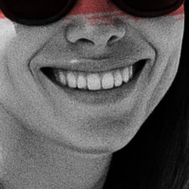 &ldquo;She smiles without defense. That is where her strength lives.&rdquo;