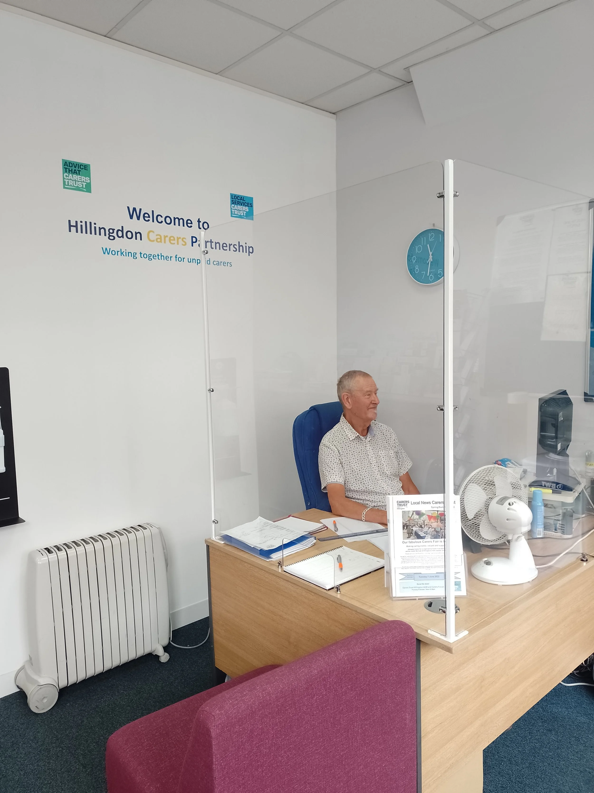 Les at reception desk.jpg