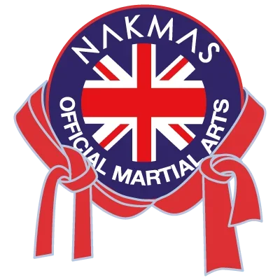 A circular logo featuring the Union Jack flag in the center, with the text 'NAKMAS' at the top and 'OFFICIAL MARTIAL ARTS' at the bottom, surrounded by a red ribbon.