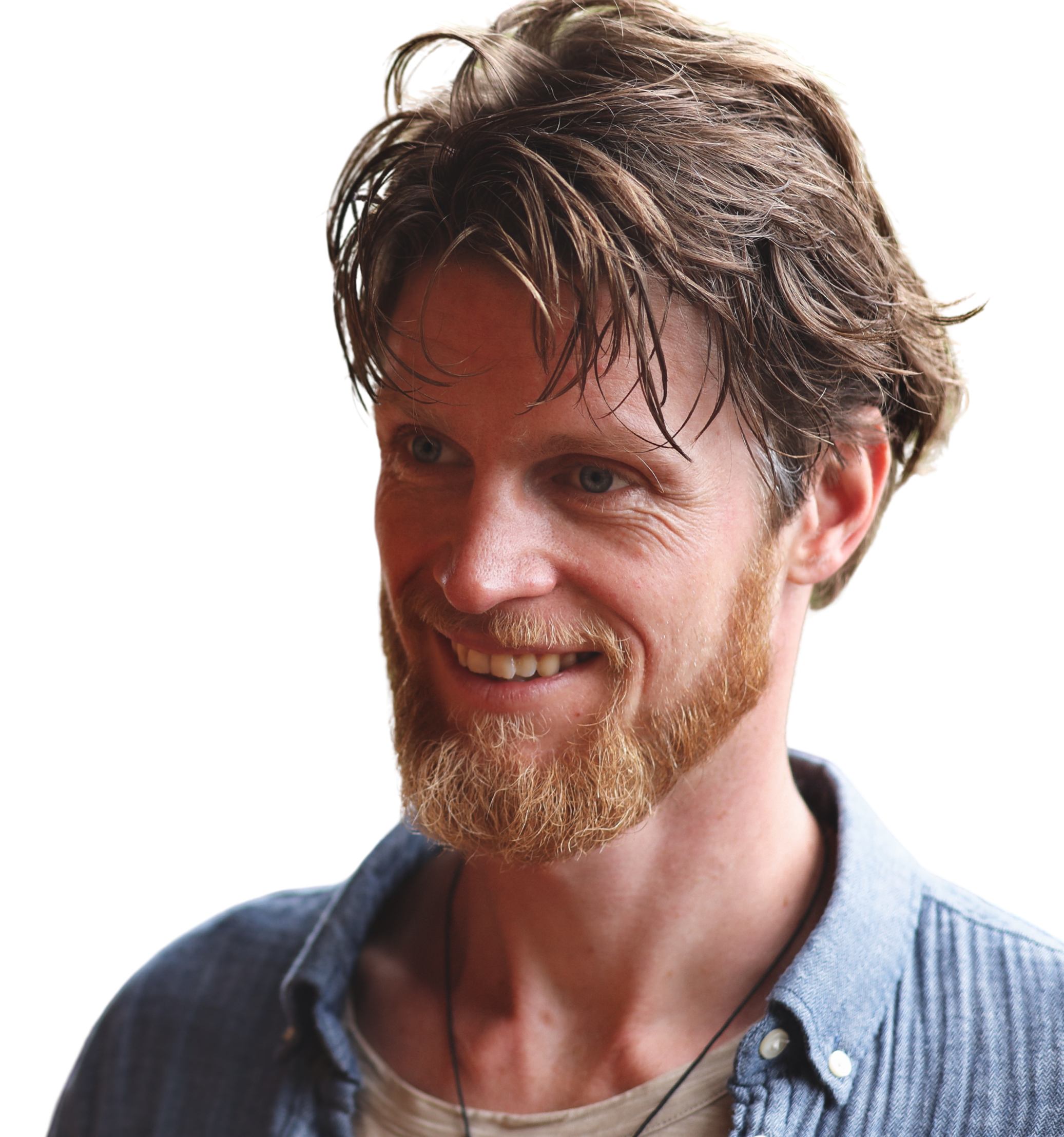 Jakob Kohlbrenner – Facilitator und Visualisierer. Porträt mit blauem Hemd, Expertise in Facilitation, Graphic Recording, Generative Scribing & Kulturentwicklung.
