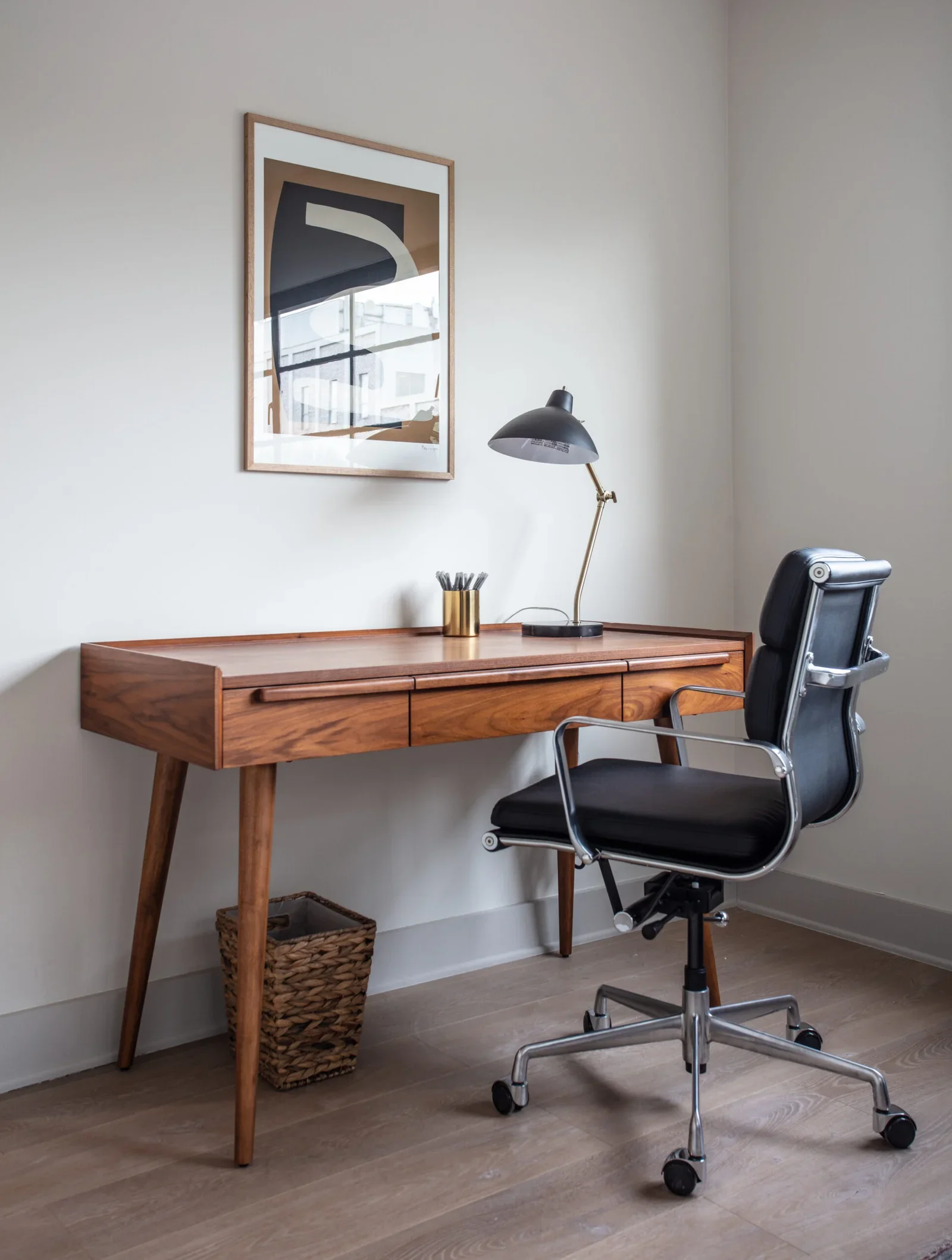 Desk and table in Stephanie Michaelian's therapy office in Larchmont Village, Los Angeles, featuring a warm, thoughtfully designed workspace.
