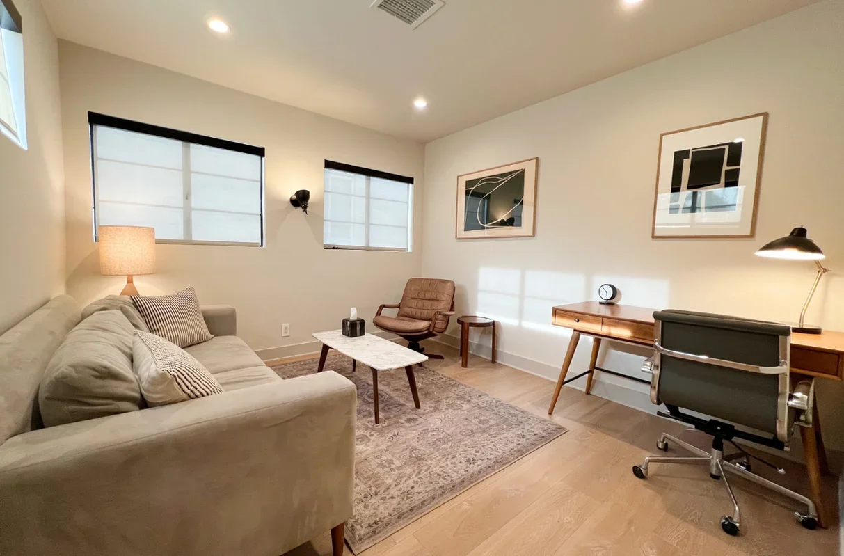 Interior of Stephanie Michaelian's psychotherapy office in Larchmont Village, Los Angeles, featuring comfortable seating, warm neutral tones, and natural light.