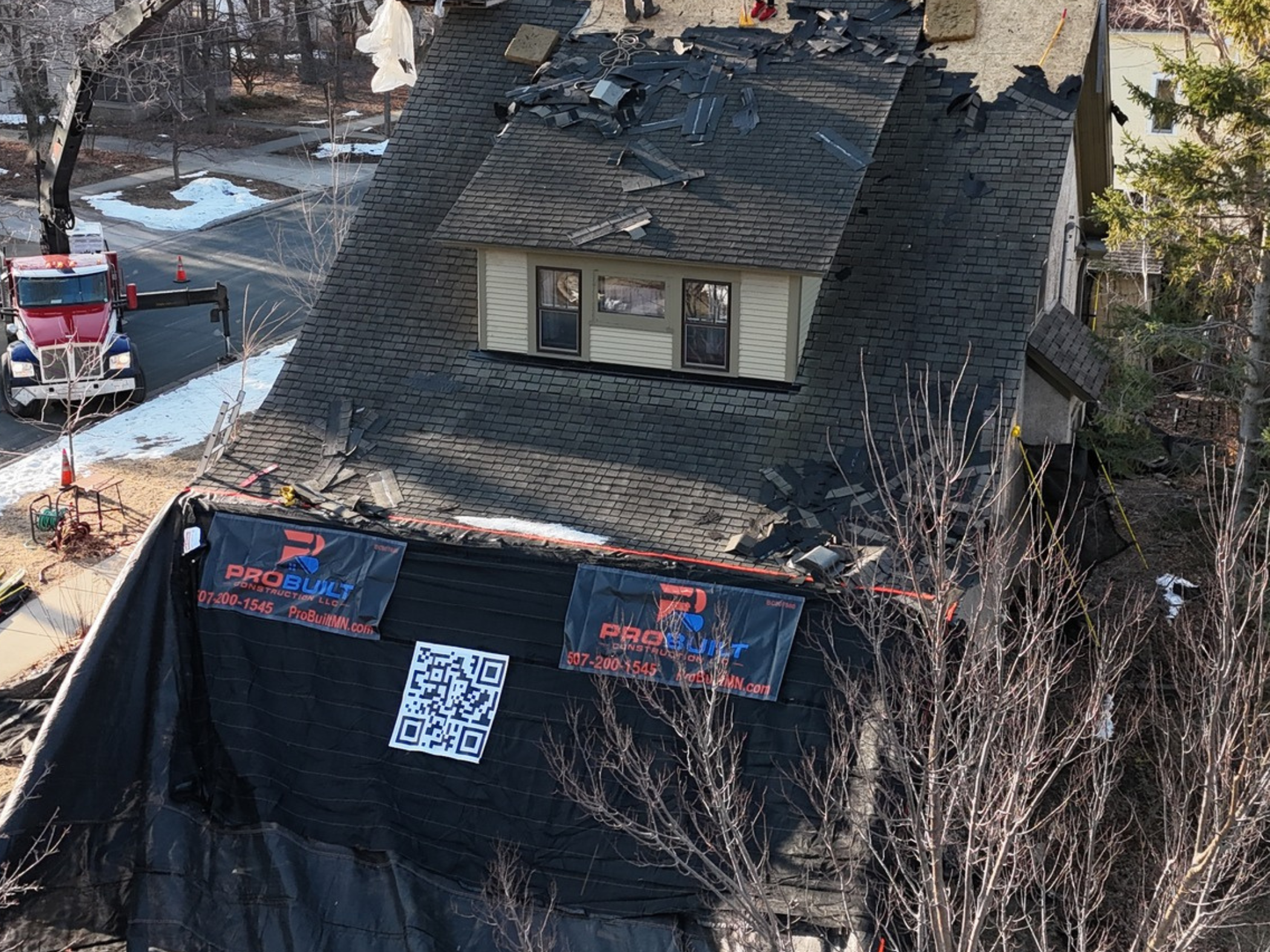 ProBuilt is installing a new roof on this Northfield home.