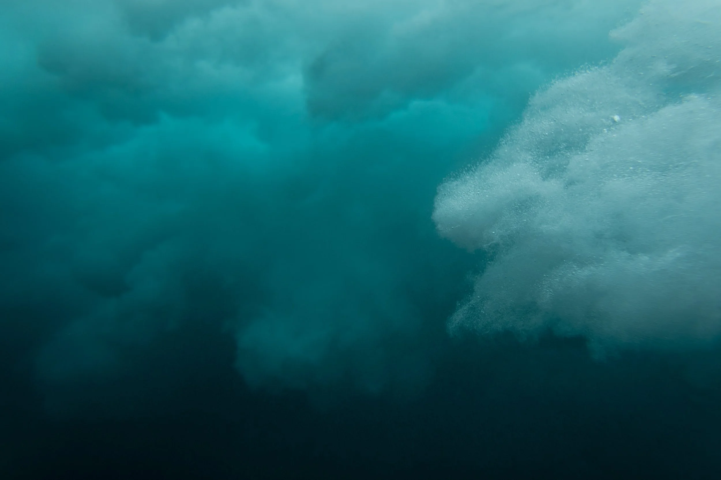 wave underwater by Denni Huis