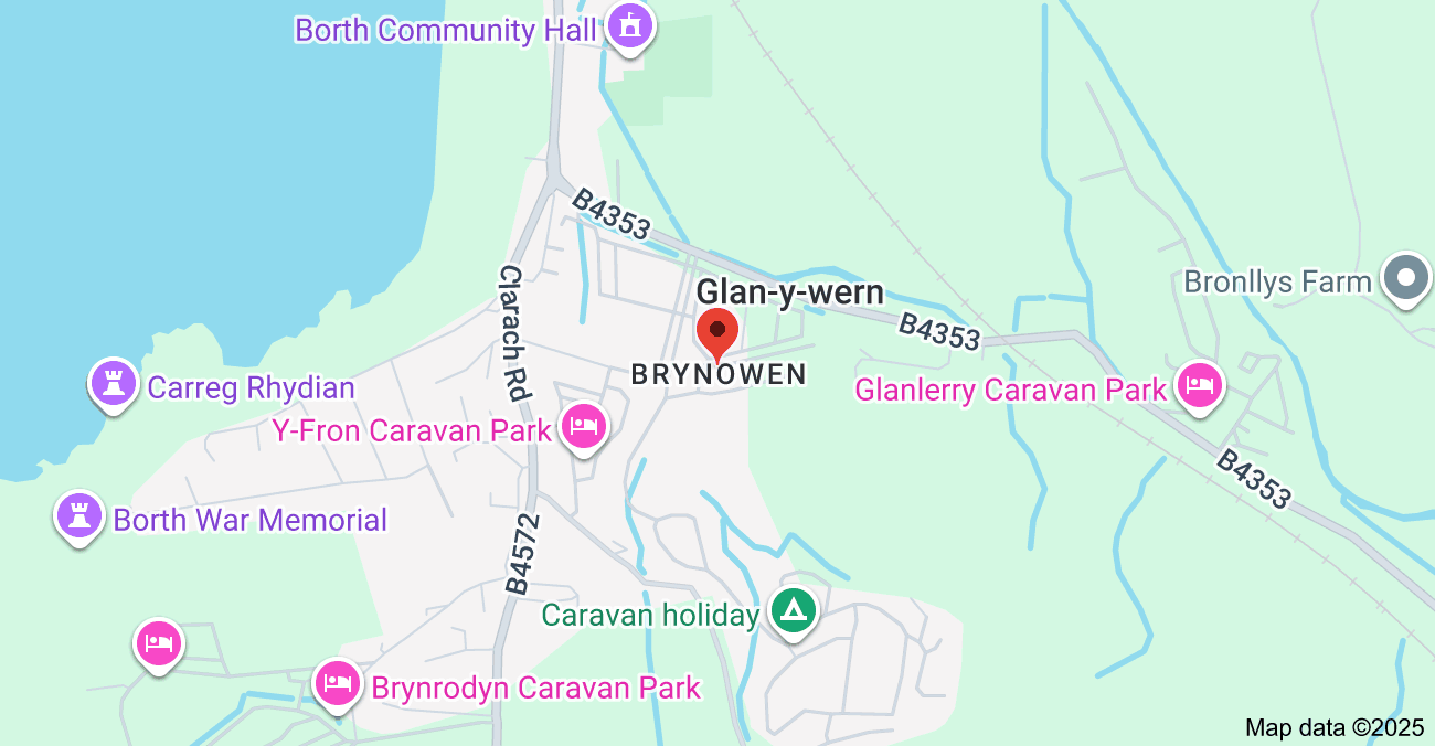 Map of Brynwon, Wales, showing Caravan Parks, a War Memorial, and a community hall, with roads and natural areas around.