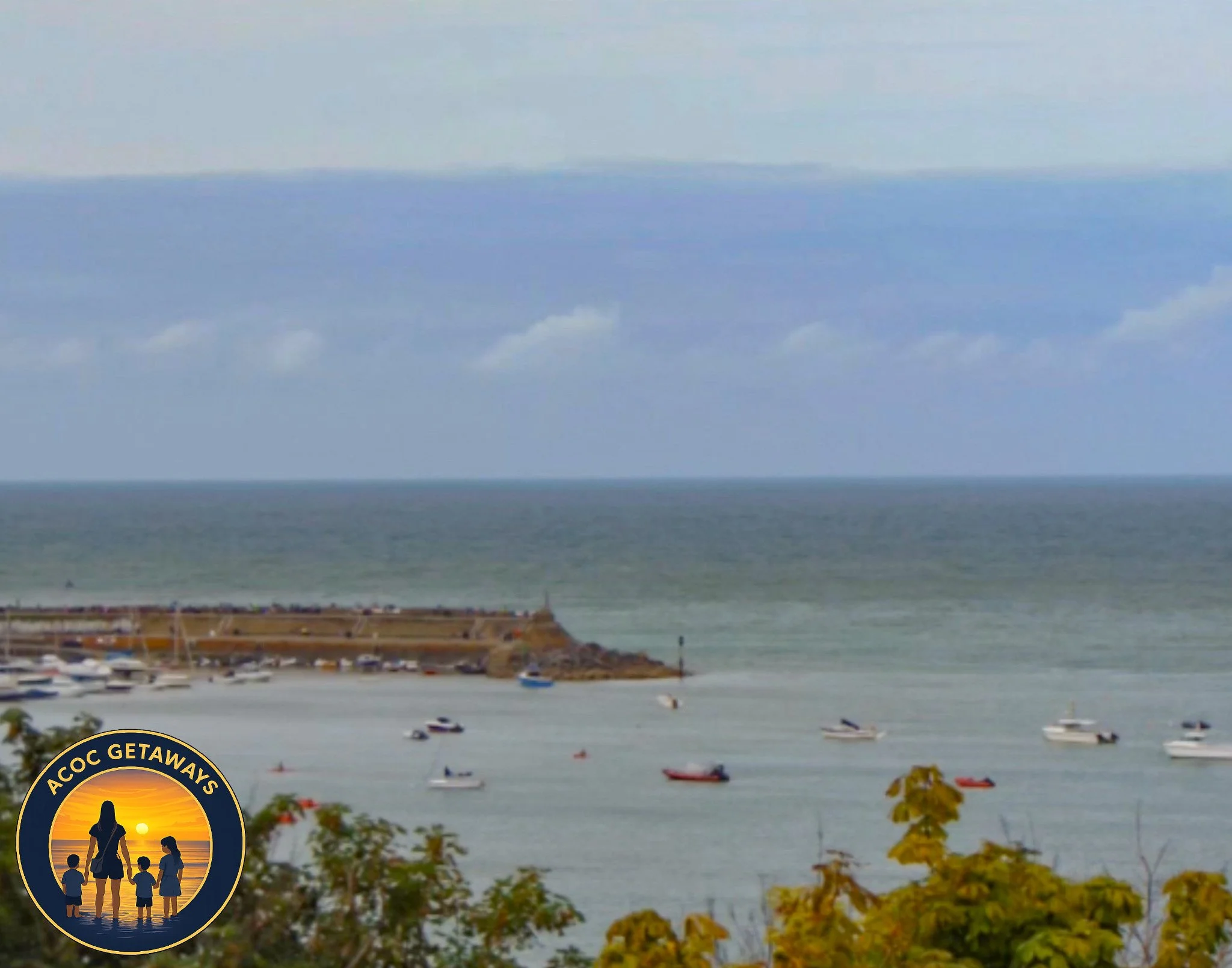 A coastal scene with boats on the water, a pier in the distance, and some trees in the foreground. An ACOC Getaways logo featuring a family silhouette at sunset is in the bottom left corner.