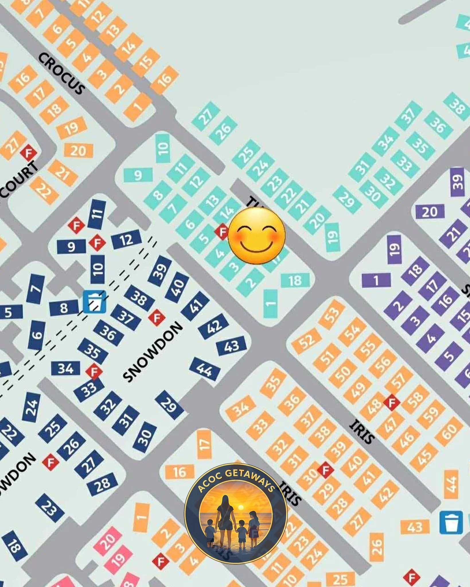 A detailed map of a campground with color-coded sections, numbered campsites, and various amenities. The map includes a happy smiling emoji in the center, an ACOK Getaways logo at the bottom, and multiple marked features such as swimming, trash disposal, and fire pits.
