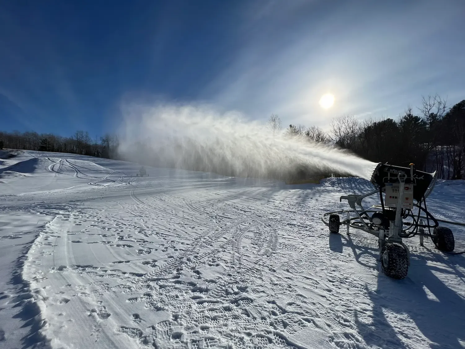 Kid Polecat on carriage making snow