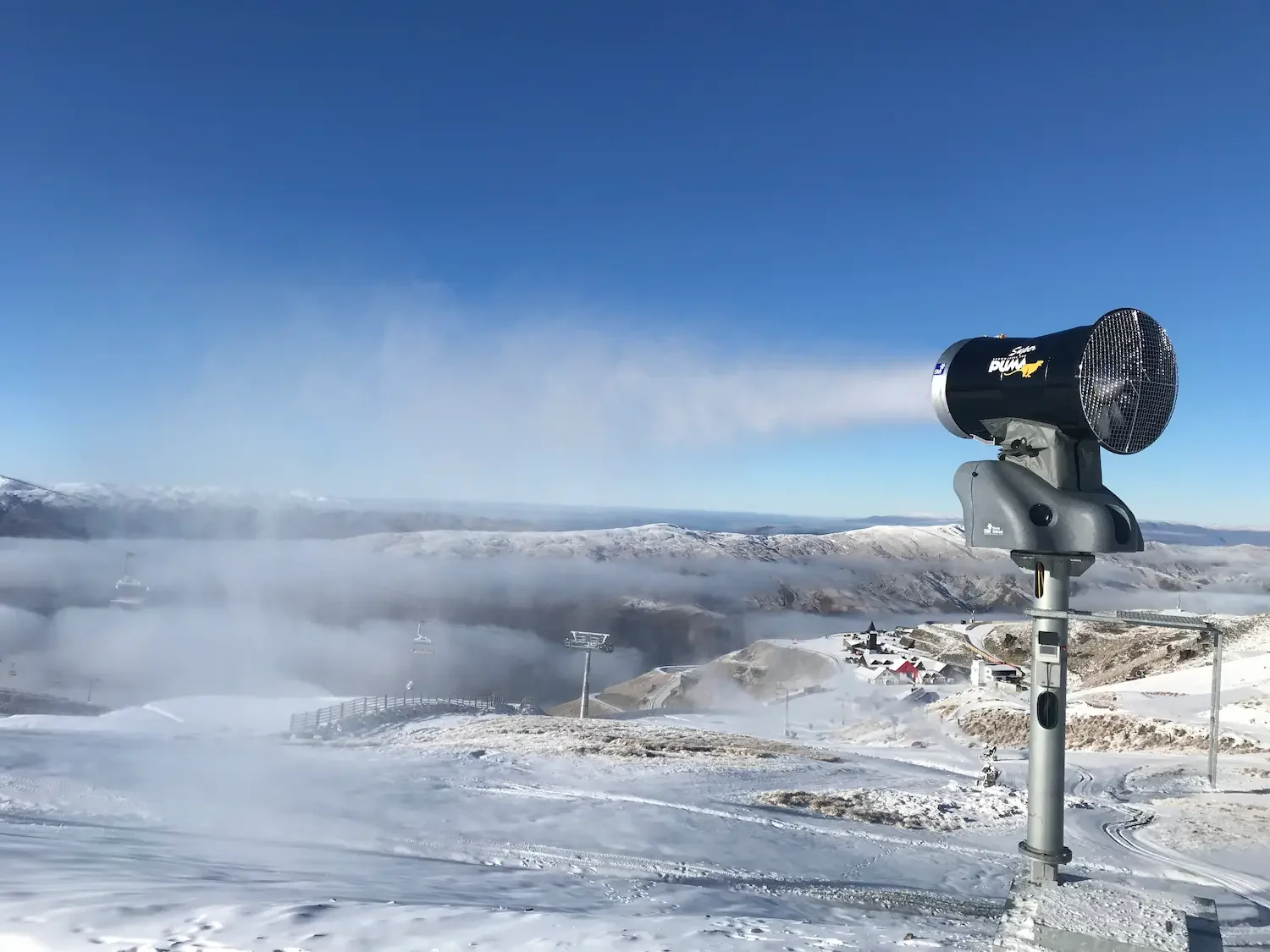Super Puma on 10" diamete tower making snow