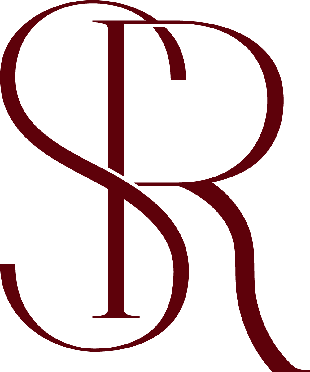 A stylized letter 'R' in dark red with a decorative swirl.