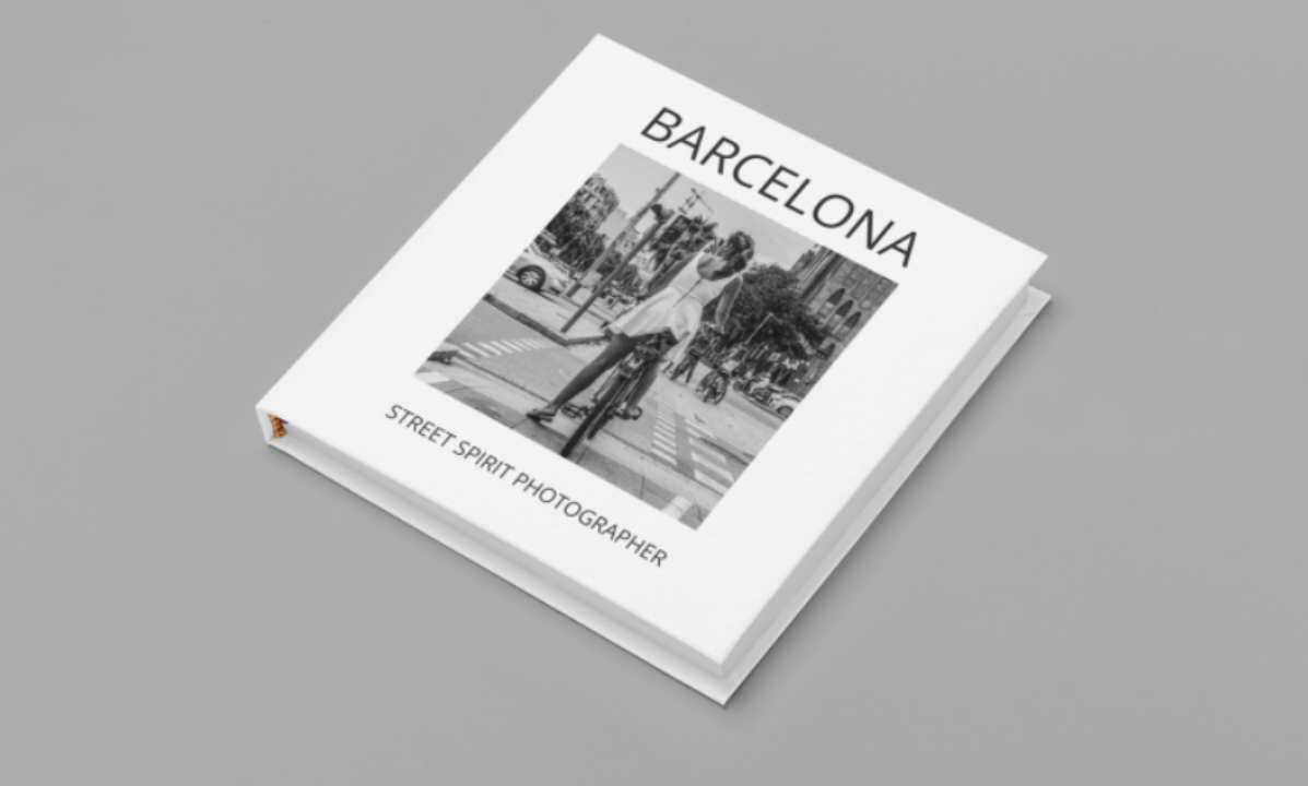A book titled 'Barcelona' with a black and white photo of a woman standing on a city street, and the subtitle 'Street Spirit Photographer'.