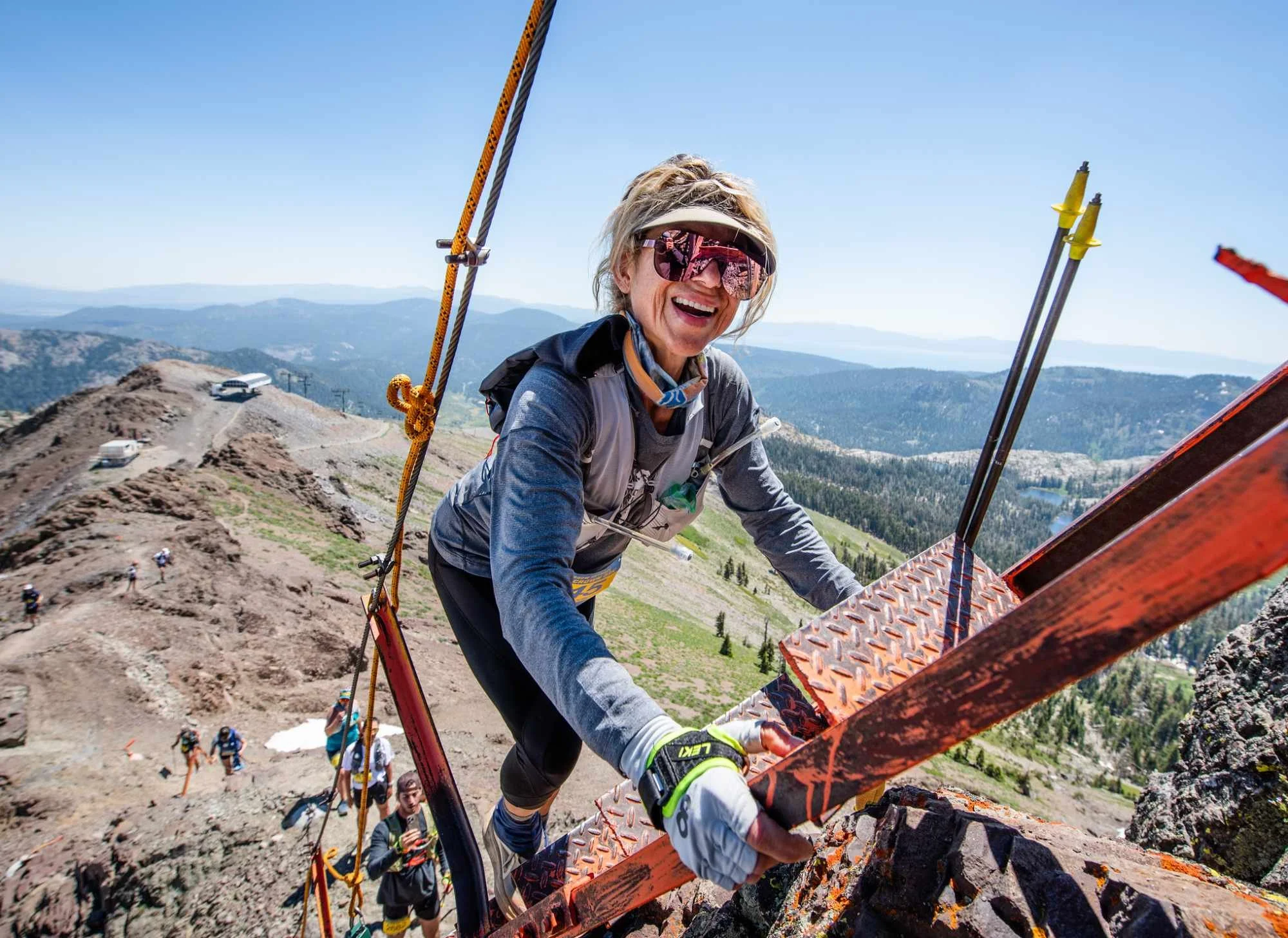 Carolyn Mahboubi, life coach for accomplished women in Los Angeles, climbing the ladders at the Broken Arrow Skyrace in Lake Tahoe