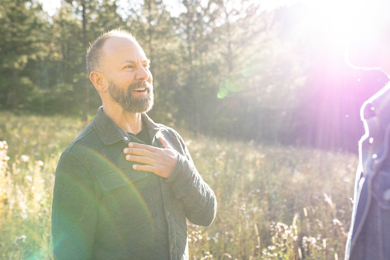 photo of shane young the founder of boulder canyon retreat center smiling in the sunhsine