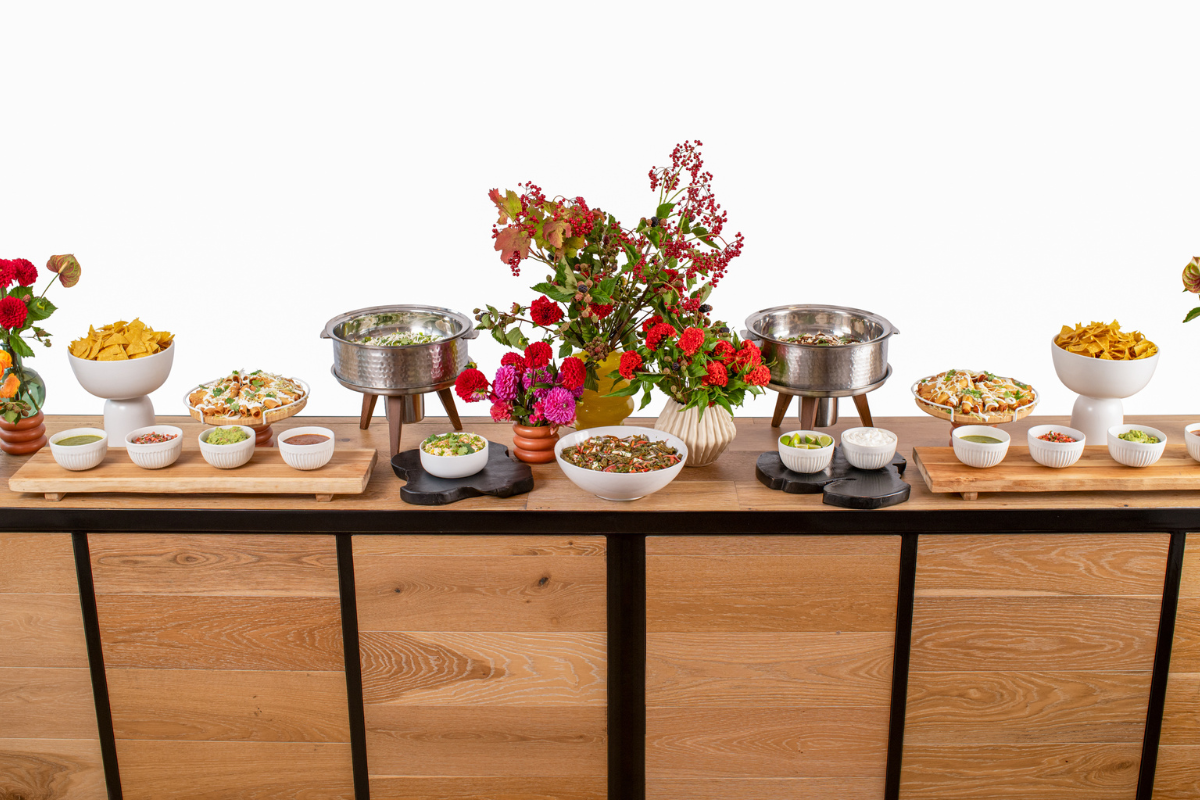 A table with a bunch of Mexican delicacies on it