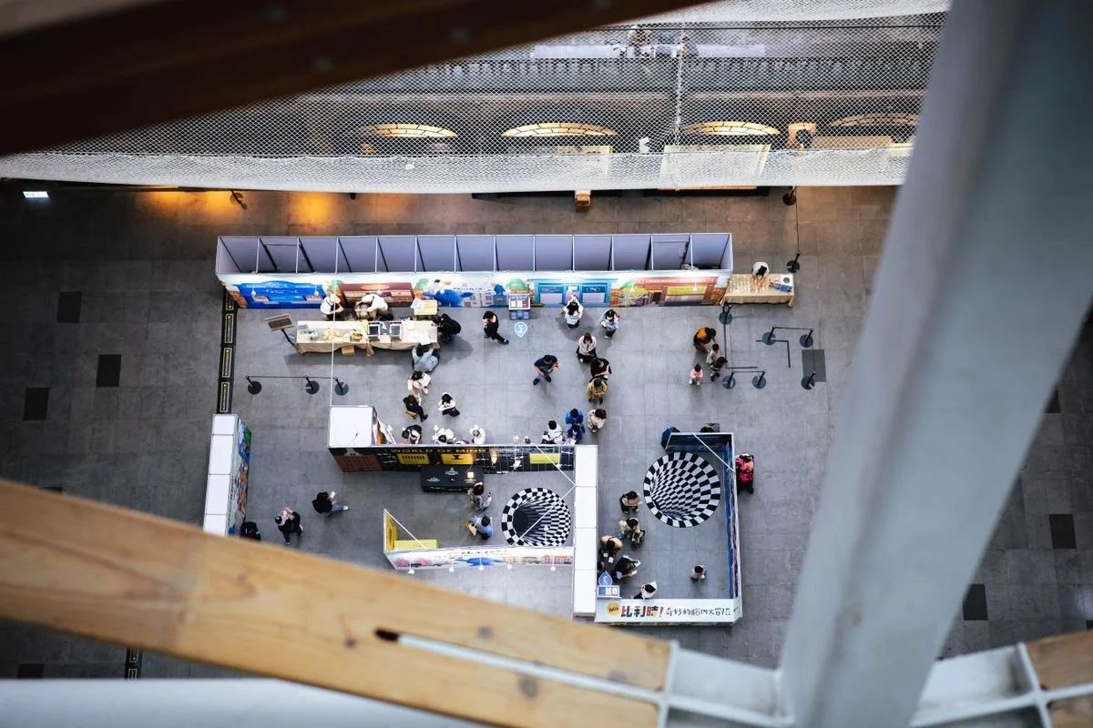 A bunch of booths set up at a trade show