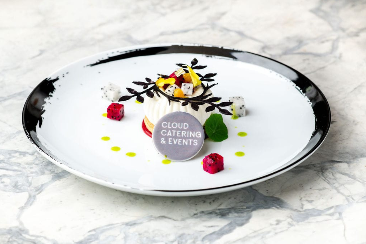 A plate with cloud branded food on it
