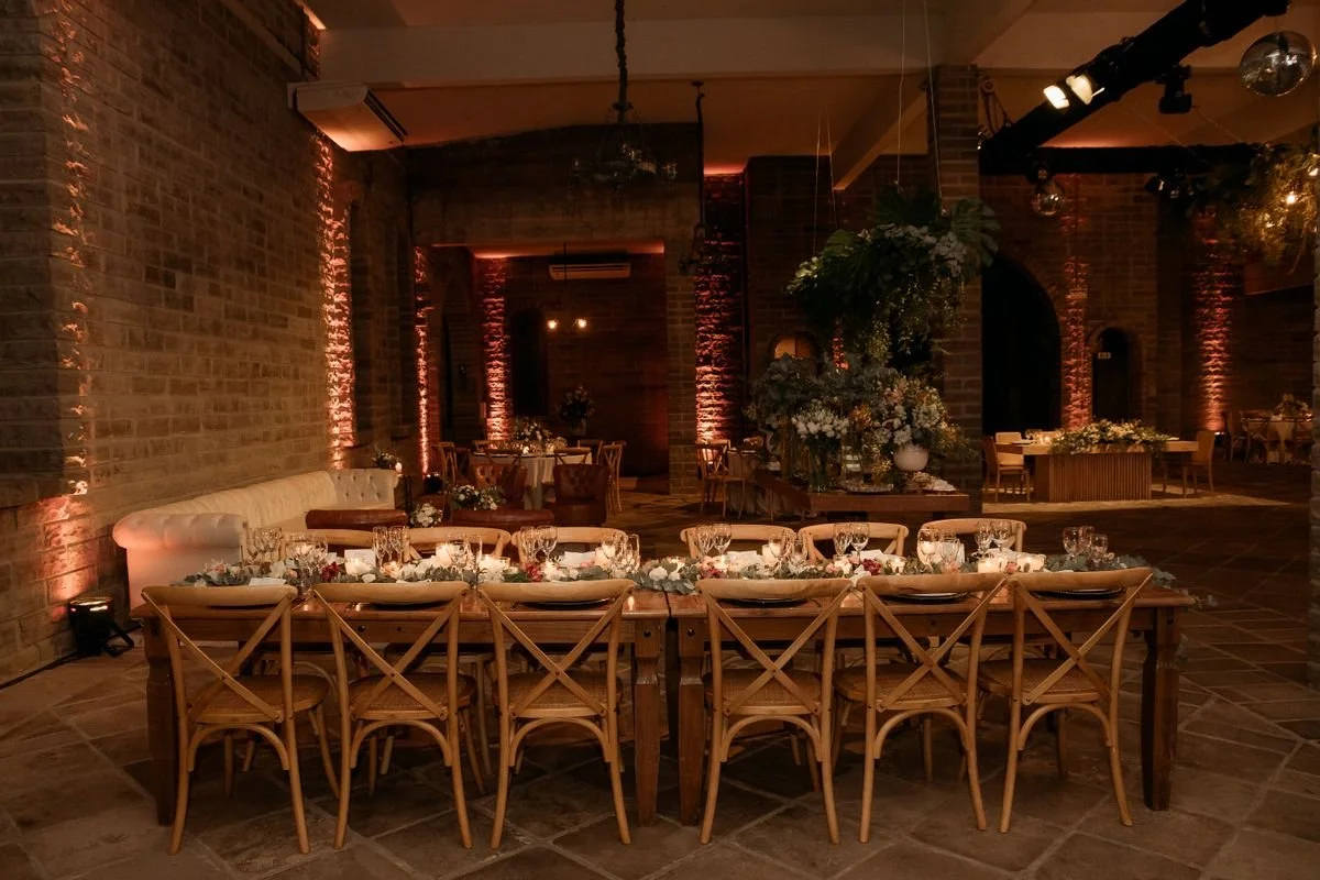 A room with a bunch of tables set up for a catering event