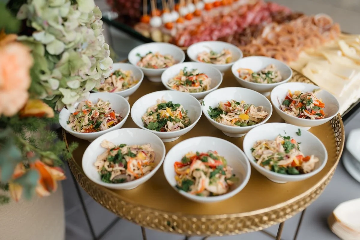 A bunch of bowls on a small table at a networking event