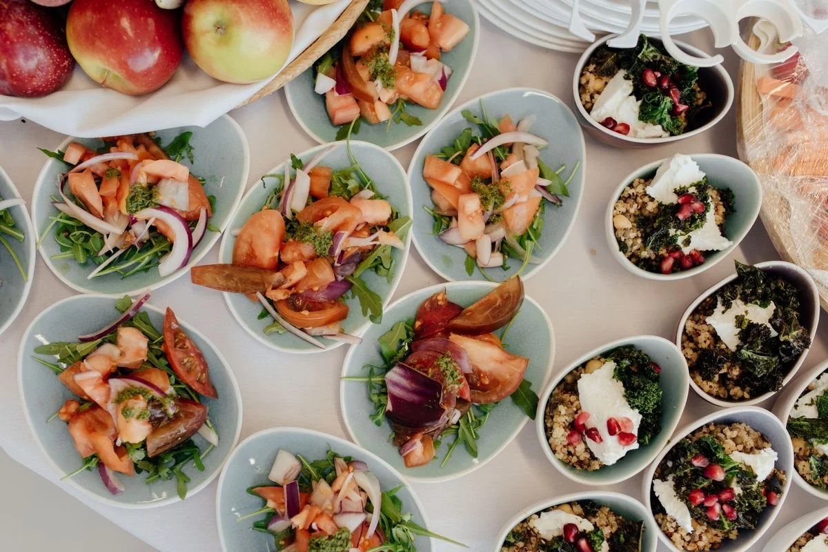 A table with a bunch of bowls of food