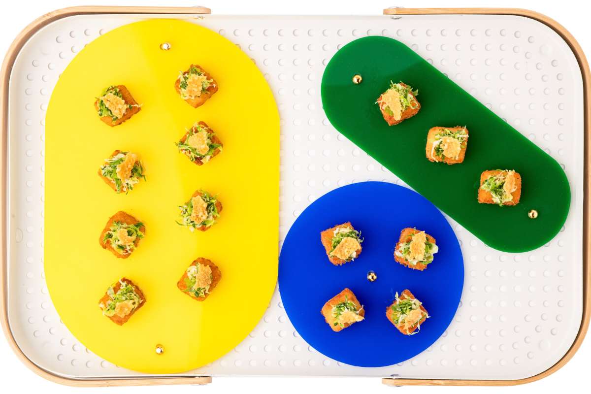 A bunch of little finger foods sitting on a platter