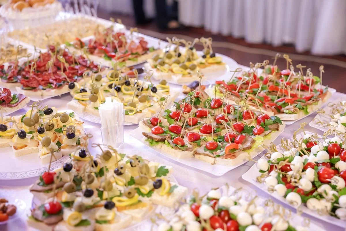 A table with a ton of food on it