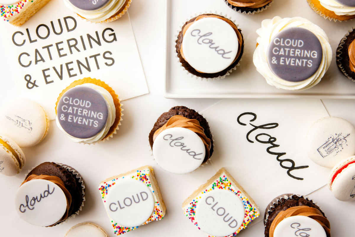 A bunch of cloud branded desserts sitting on a table