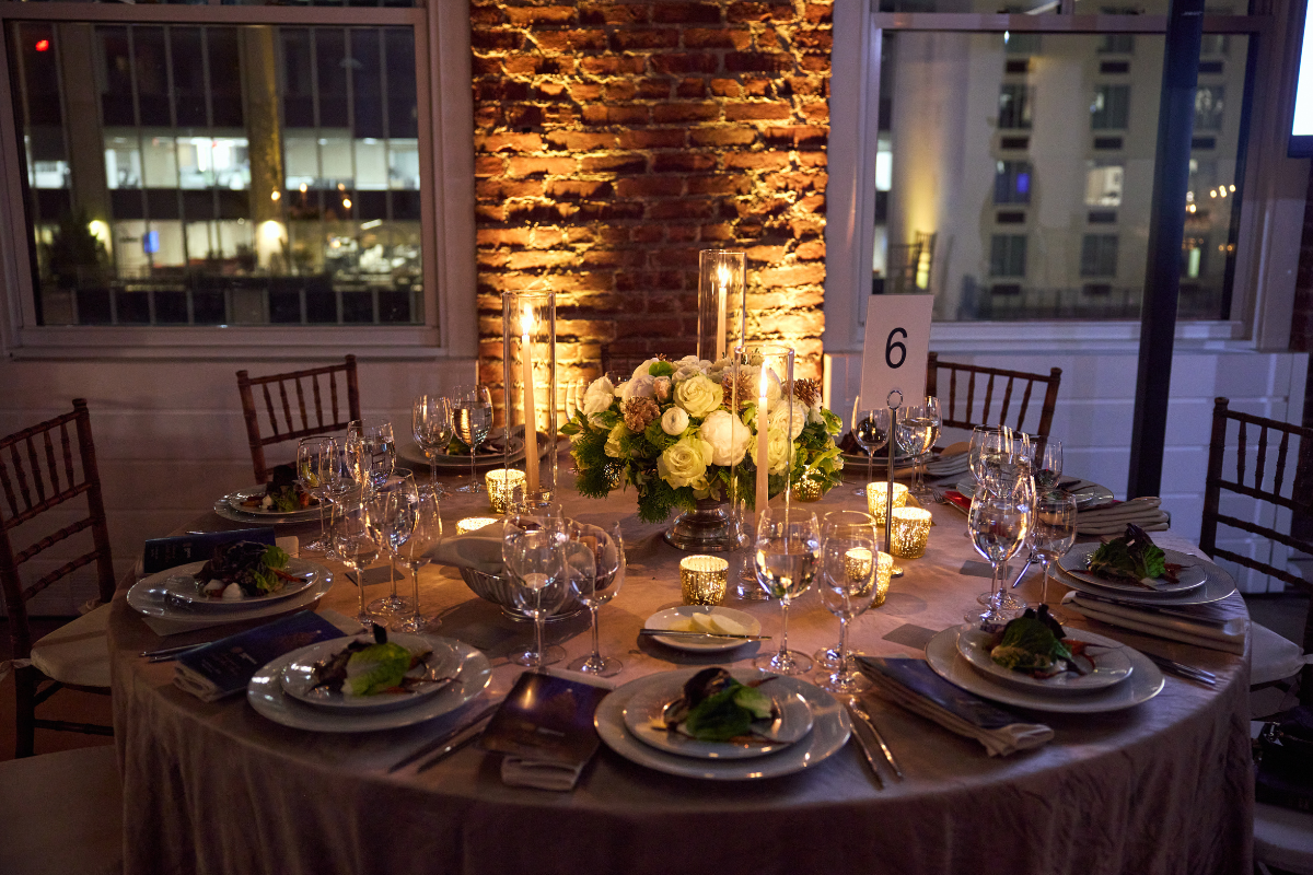 A table ready for a catering event with candles