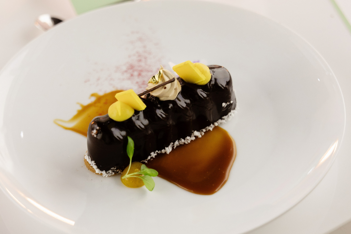 A dessert sitting on a plate ready for a catered event
