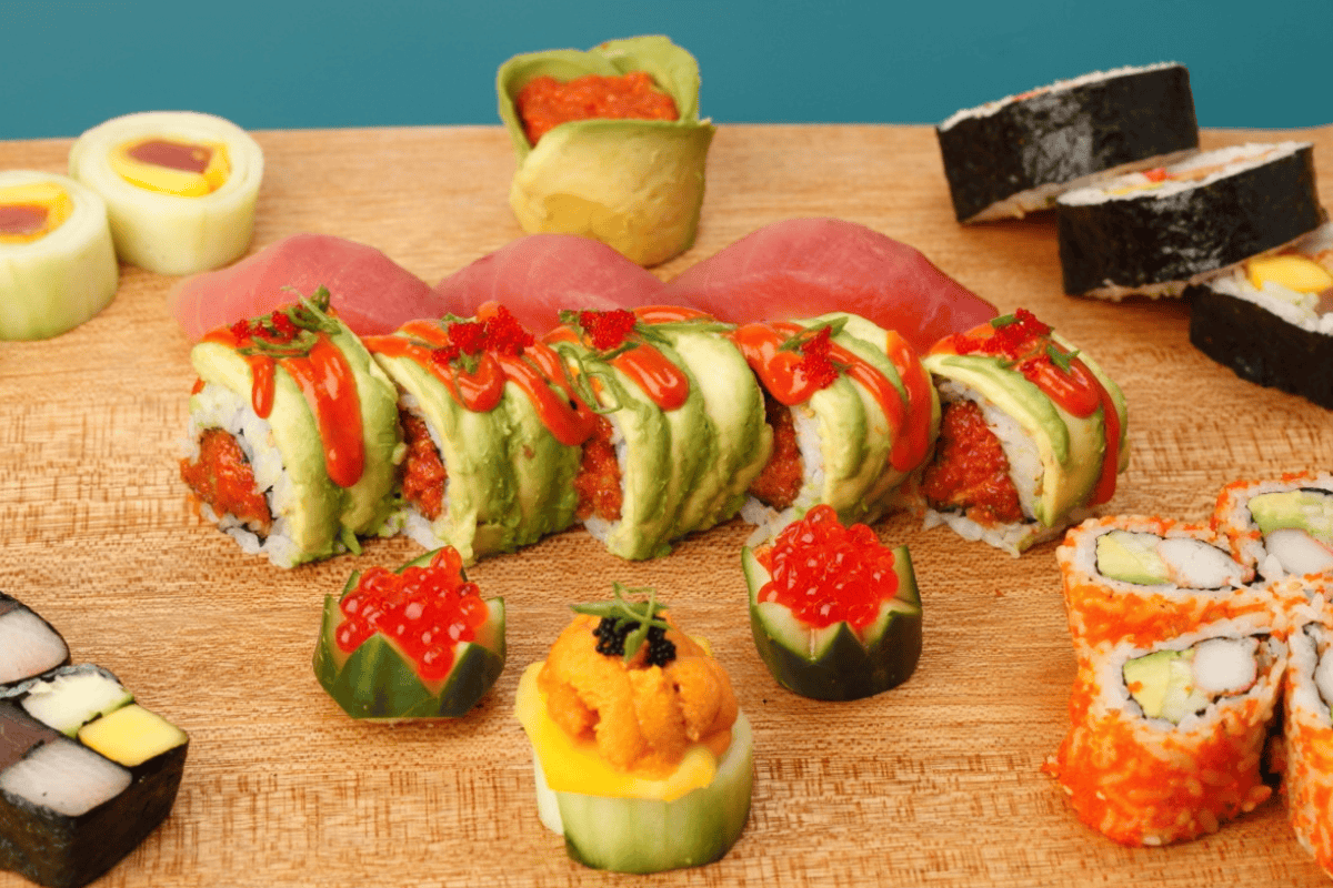 Sushi sitting on a table ready for a catering event
