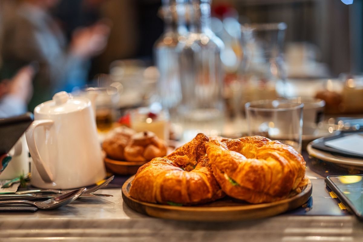 A couple croissants sitting on a table