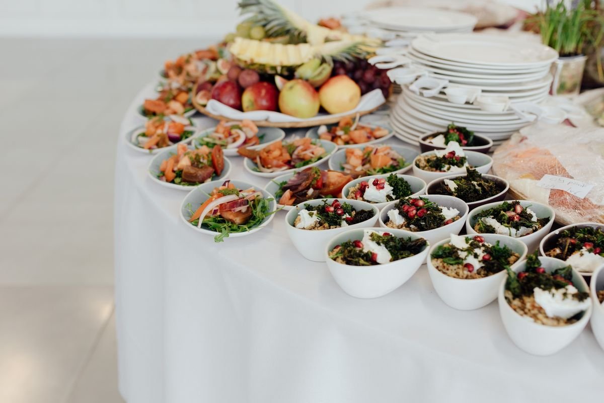 A table with a bunch of bowls of food
