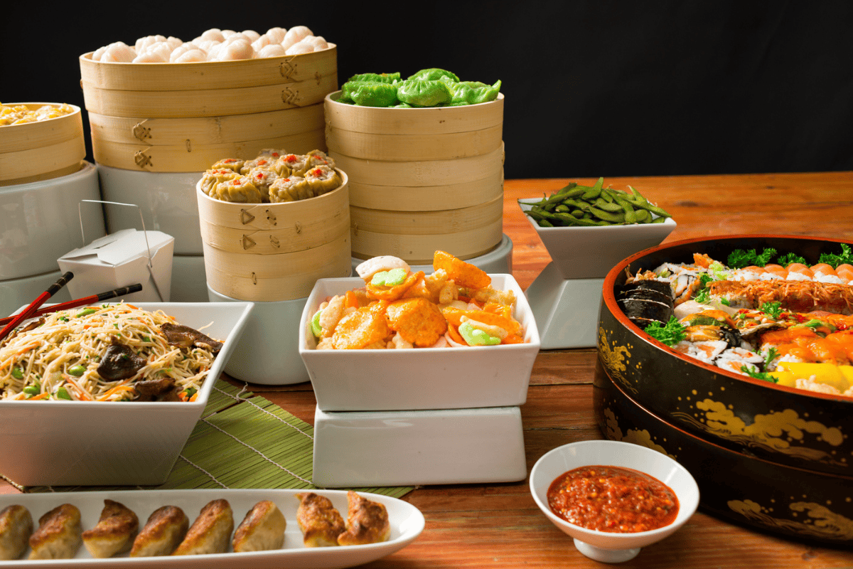 A table of Asian food ready to eat