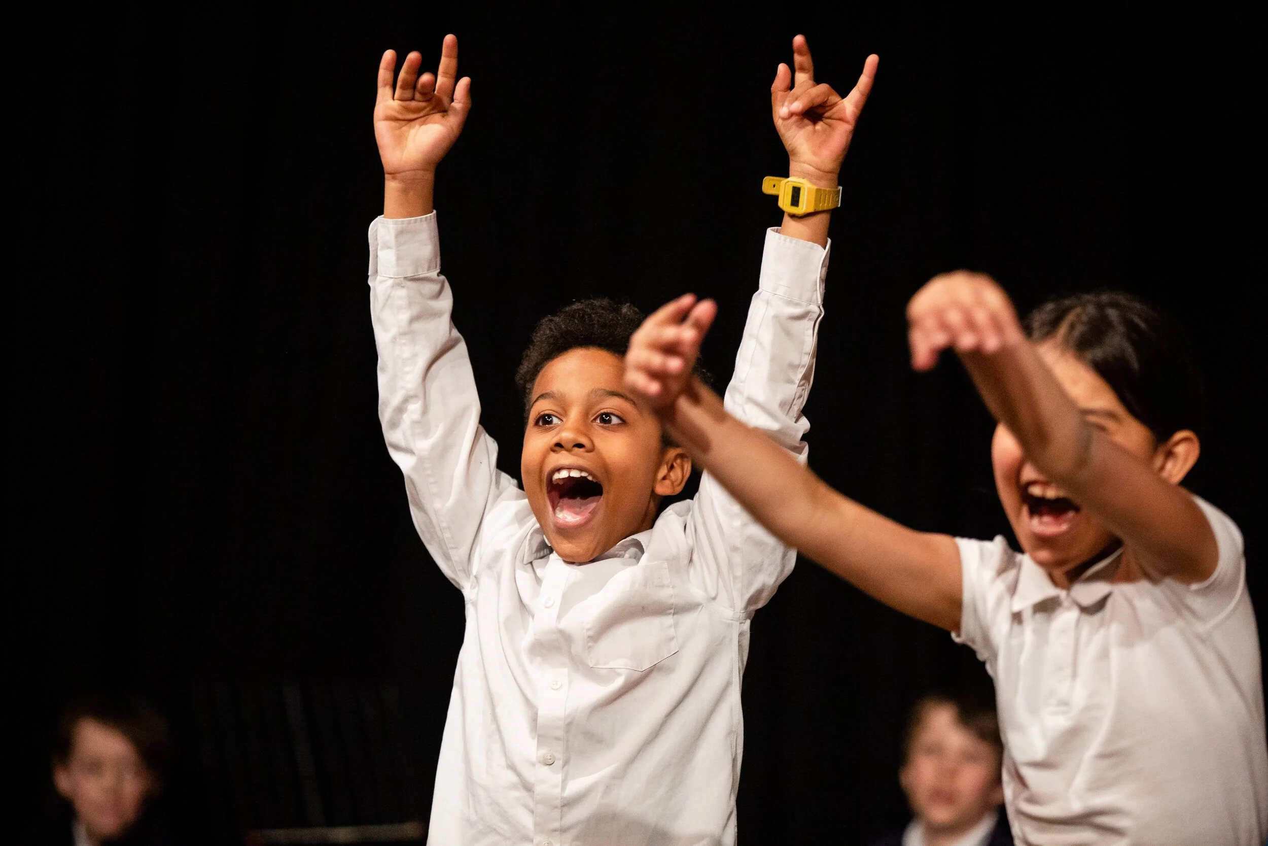 Smiling young people during a performance