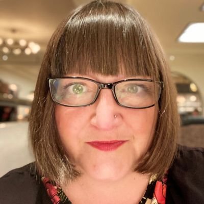 A headshot of Sarah Argent