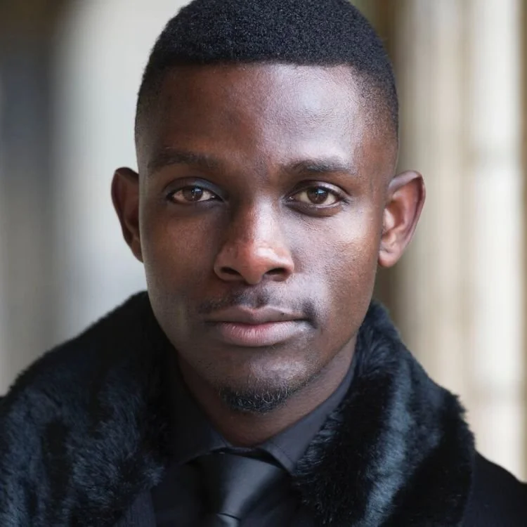 A headshot of John Pfumojena