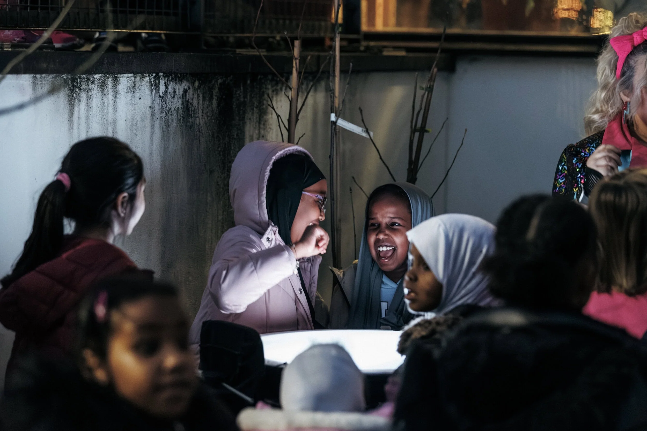 Children smiling at Winter Lights performance