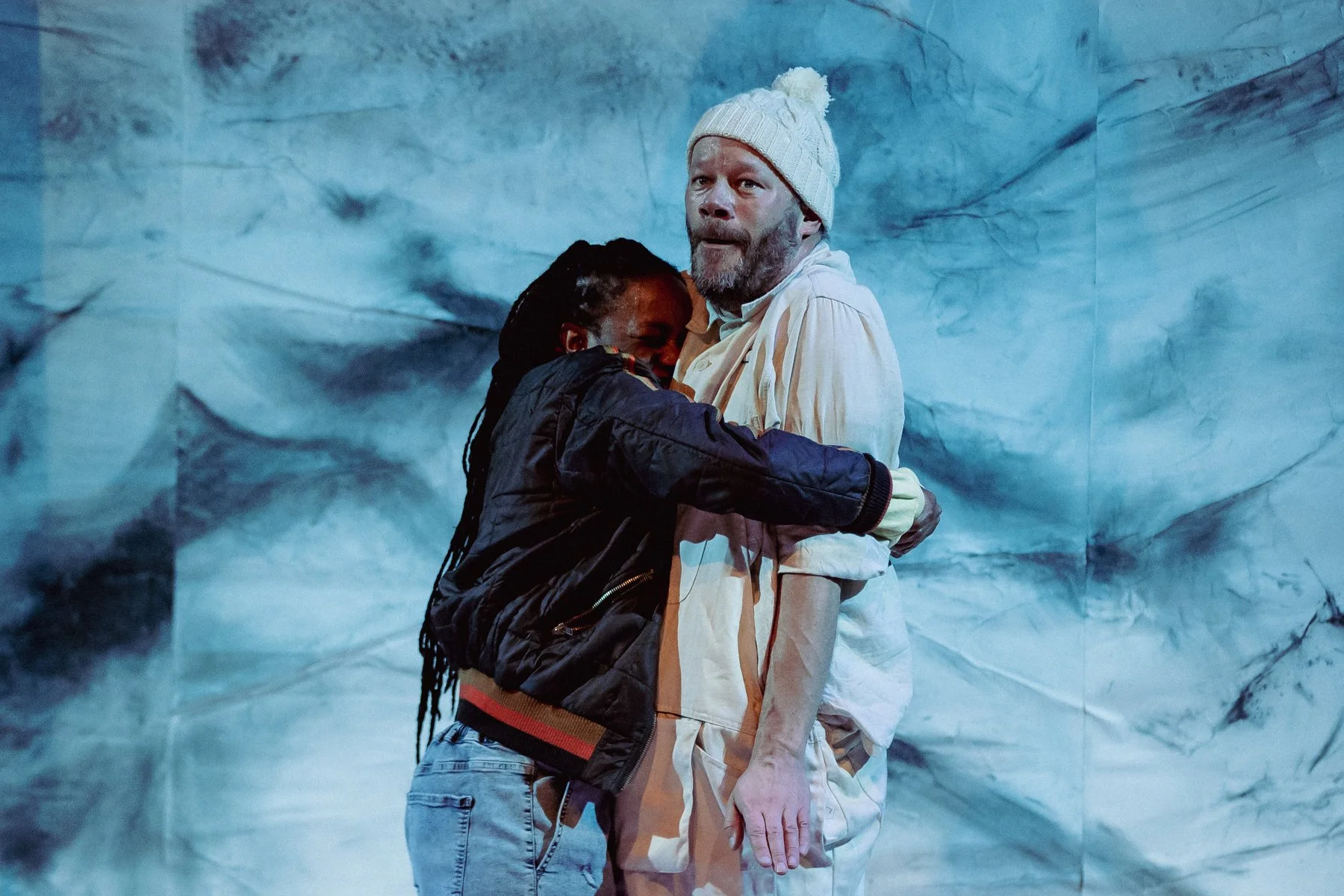 Sebastien hugs Belle tightly. Belle and Sebastien performed at Bristol Old Vic.