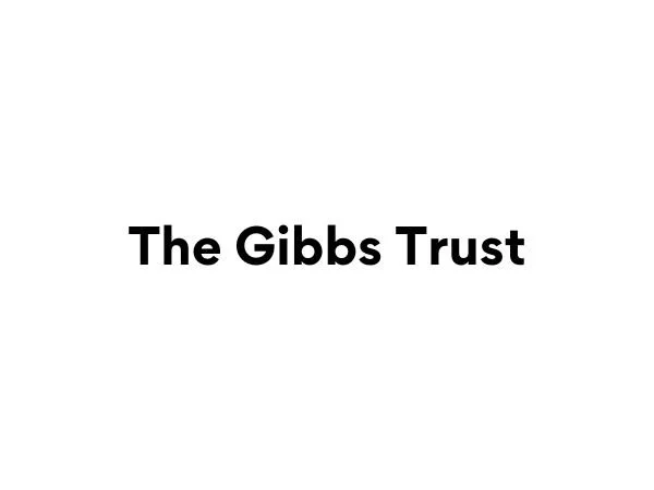 Text saying 'The Gibbs Trust' in bold black font on a white background.