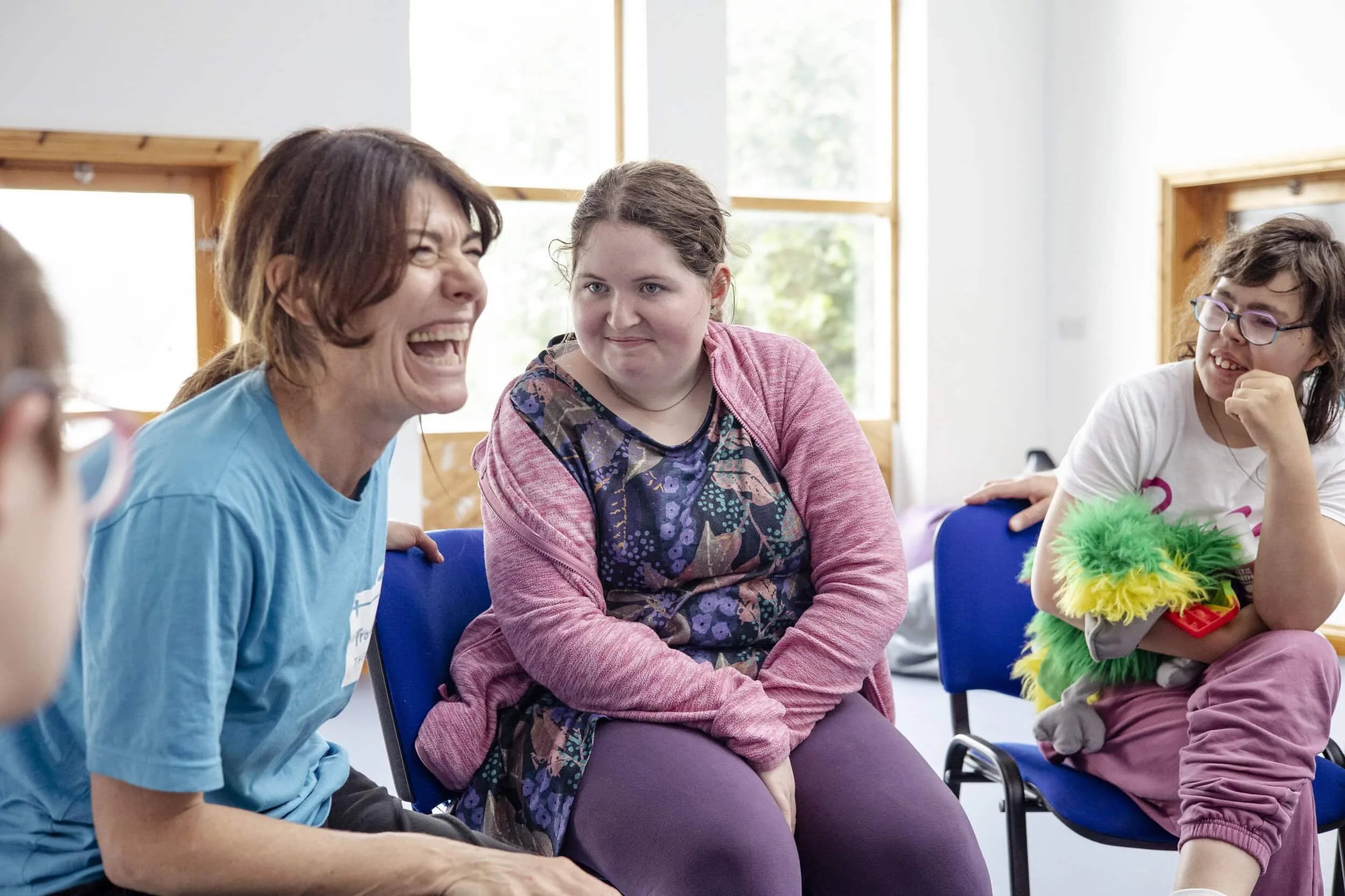 A facilitator and member taking part in a Louder Than Words session