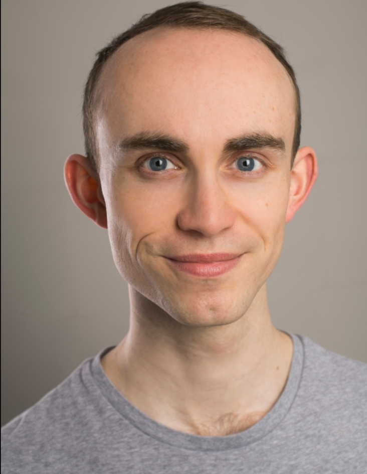 A headshot of Harry Kingscott