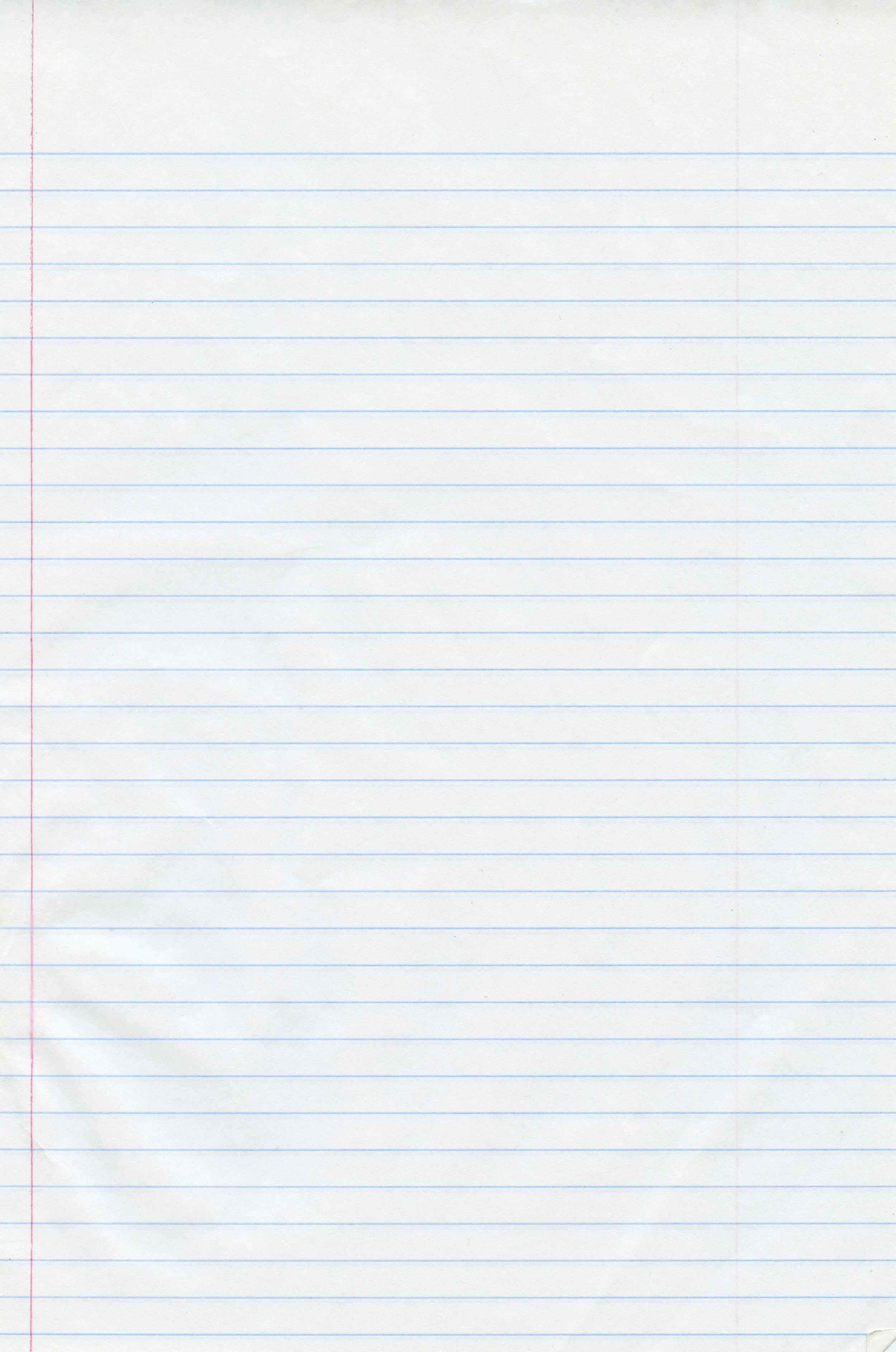 A blank sheet of notebook paper with blue lines and a red margin on the left side.