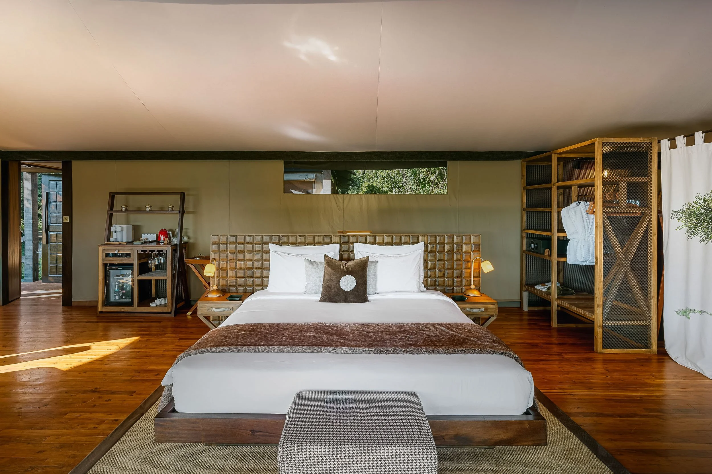 Luxury resort suite interior photography featuring bespoke design, natural textures, and premium accommodation.